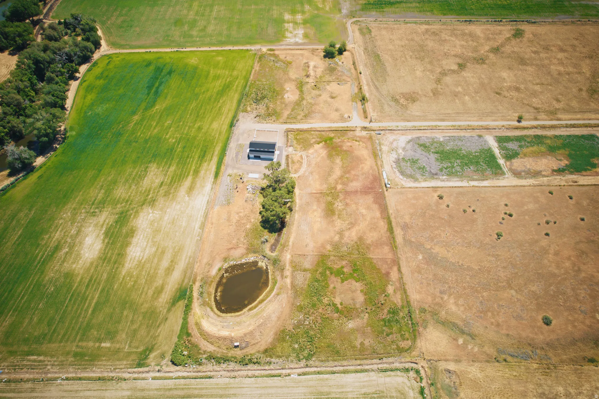Aerial perspective showcasing agricultural land with varied crop fields
