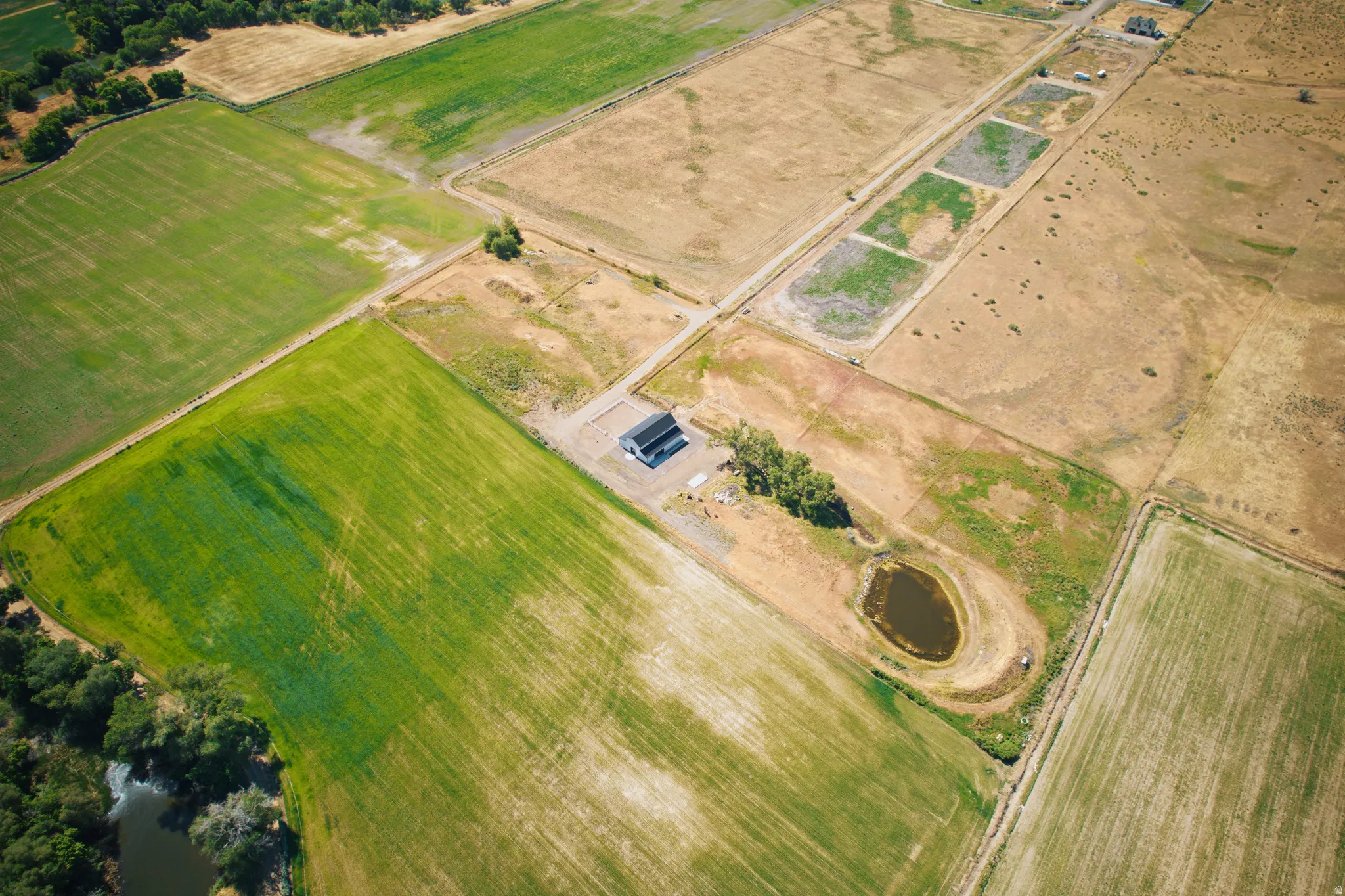 Aerial perspective showcasing expansive agricultural land