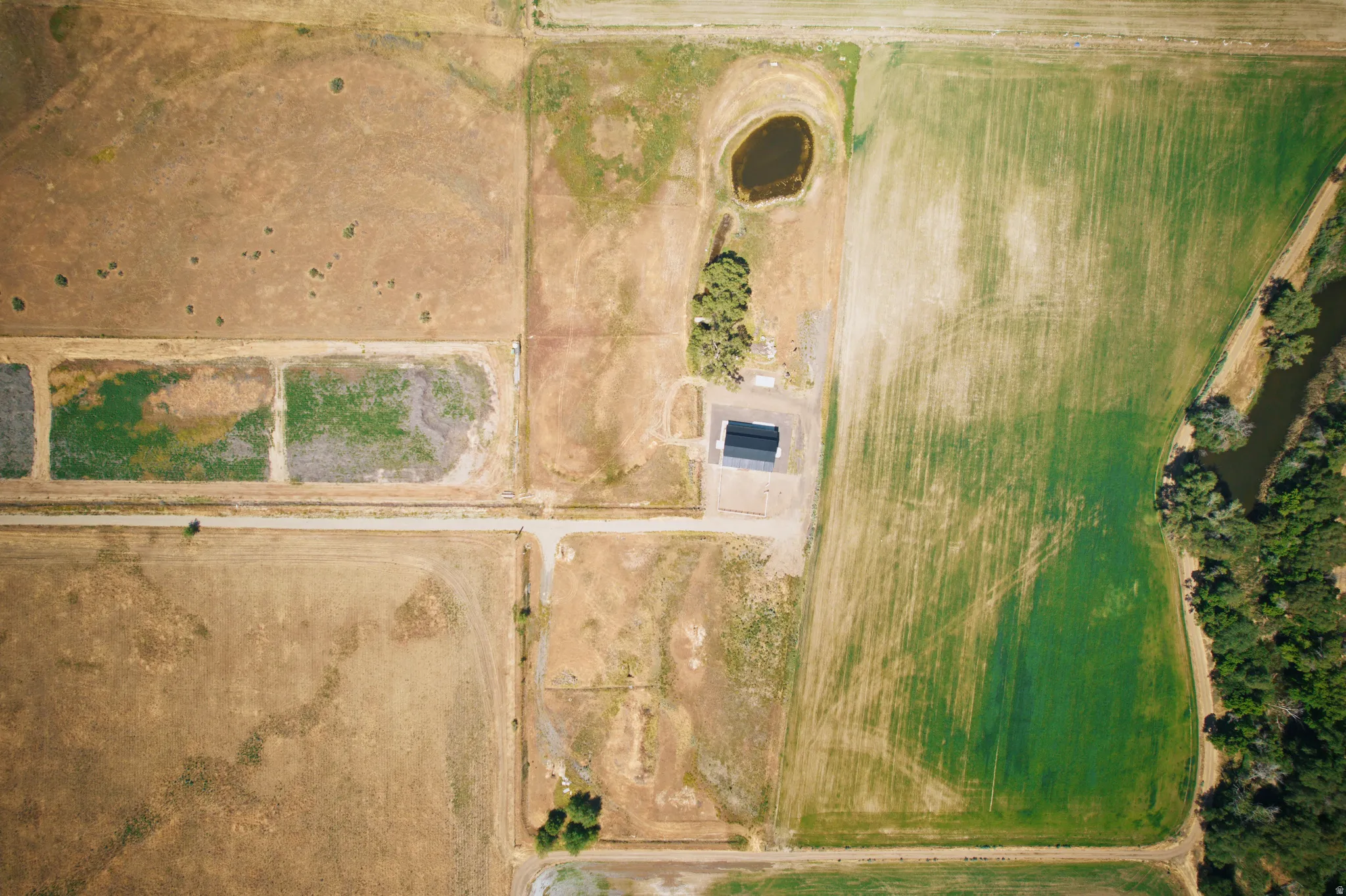 Aerial perspective showcasing expansive agricultural land