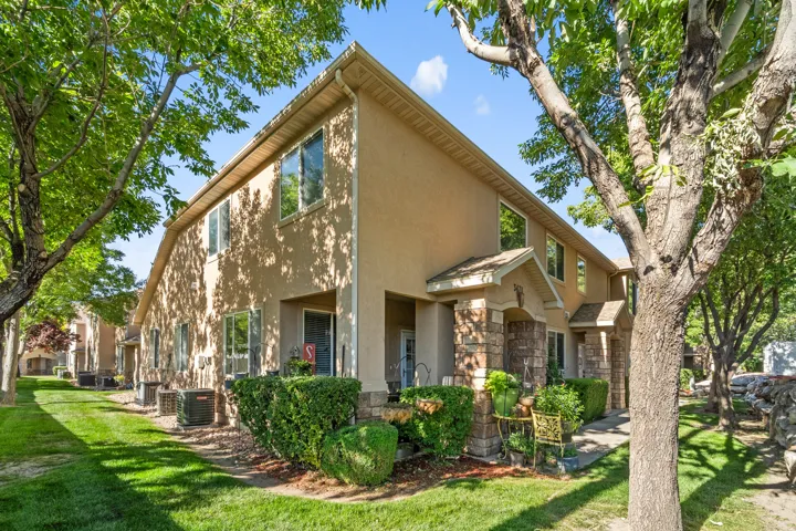 Exterior with mature landscaping