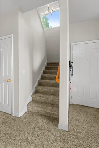 New carpet throughout  switch back stairs