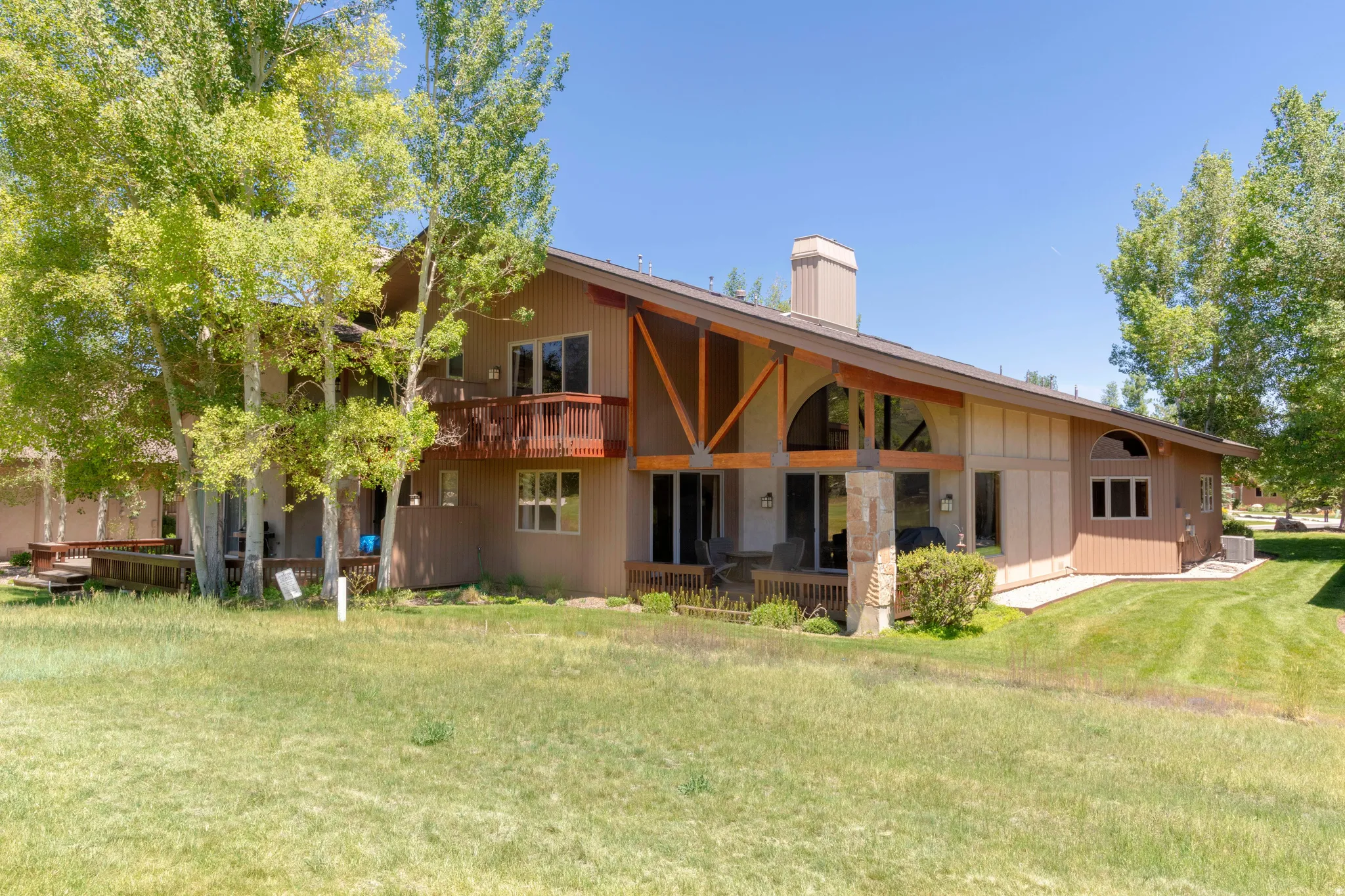 Contemporary two-story exterior with a wood-sided finish