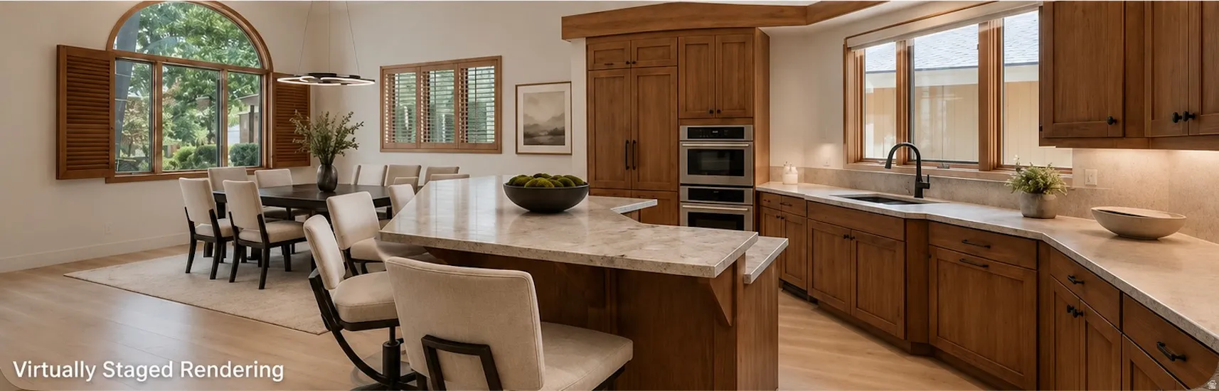 Expansive kitchen featuring a large island with seating, integrated double ovens, and wood-finish cabinetry