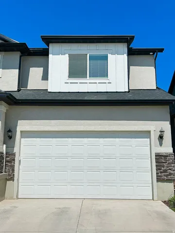 Two-car garage with panel-style door