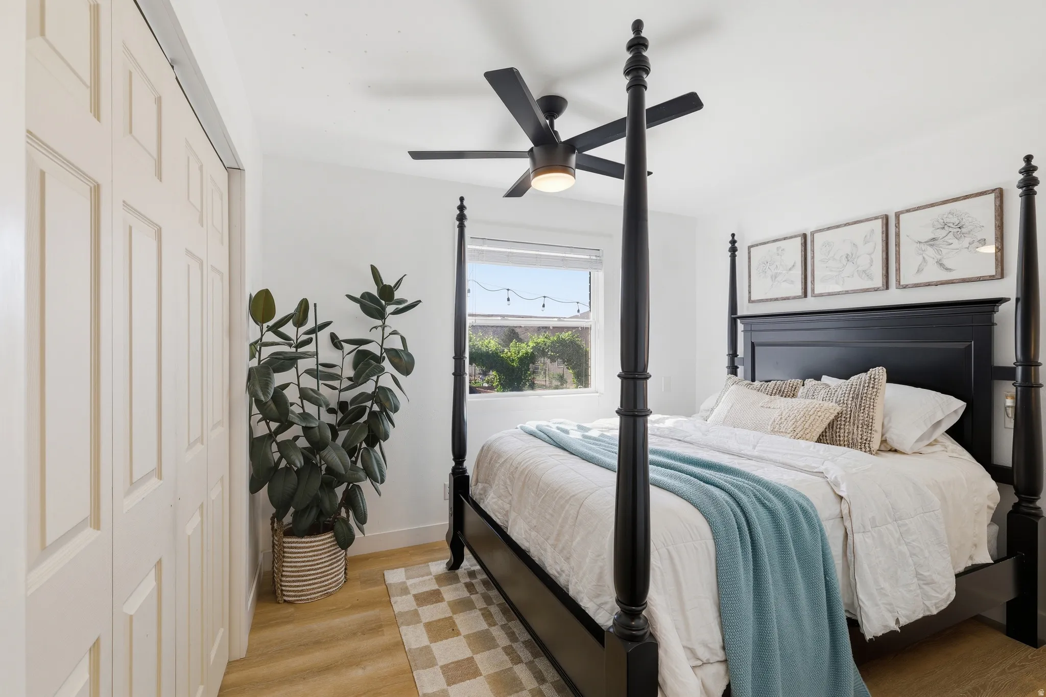 Light wood-finish flooring complements white walls and trim