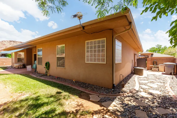 Stucco exterior with multiple windows