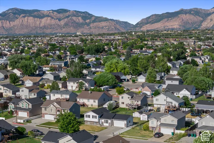 Expansive residential area with a clear sky backdrop and mountainous scenery