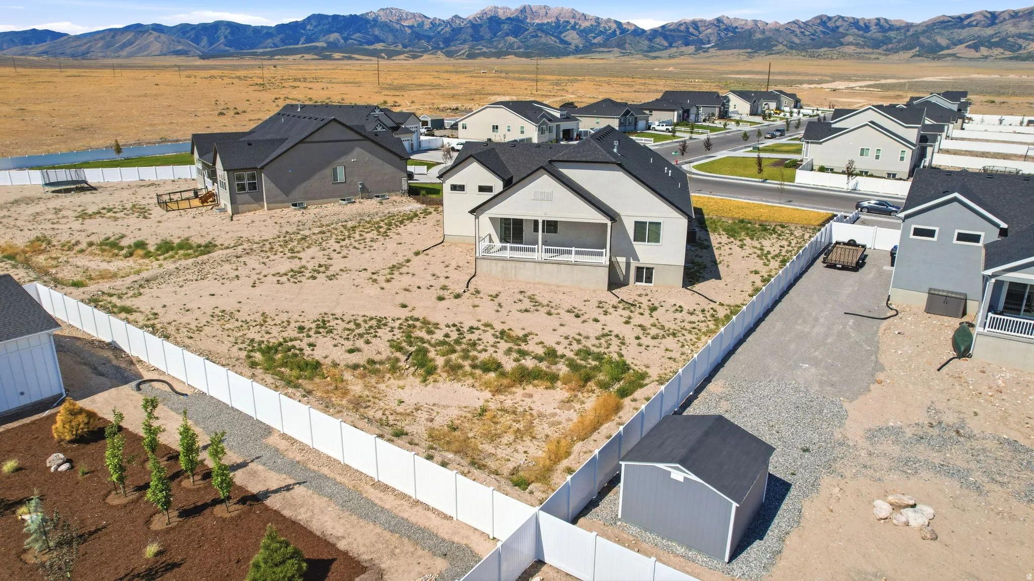 Contemporary residence featuring a covered deck and a walk-out basement