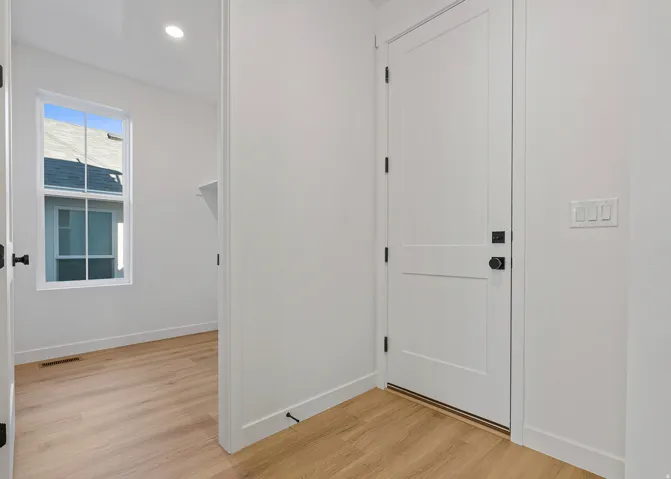 White interior door with contemporary black hardware
