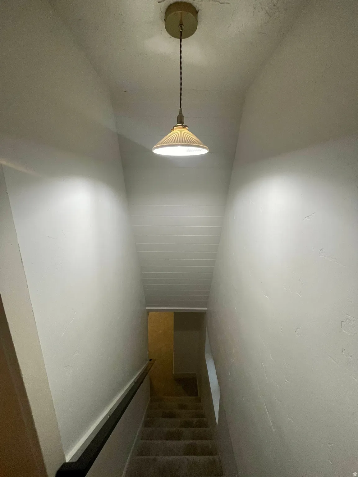 Stairwell to basement living room.