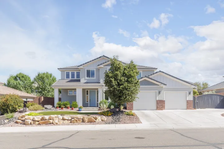 Contemporary two-story exterior with gray siding and white trim