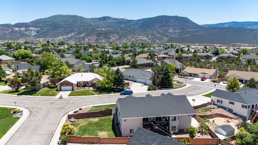 Suburban neighborhood featuring a variety of single-family residences with mature trees