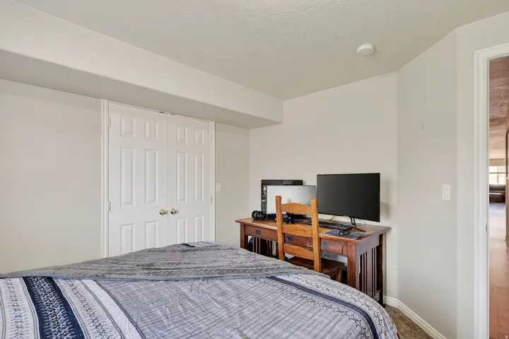 Neutral wall color with a white ceiling and baseboards