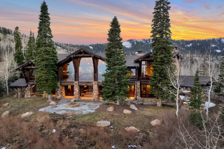 Mountain-style residence featuring extensive stone and timber framing