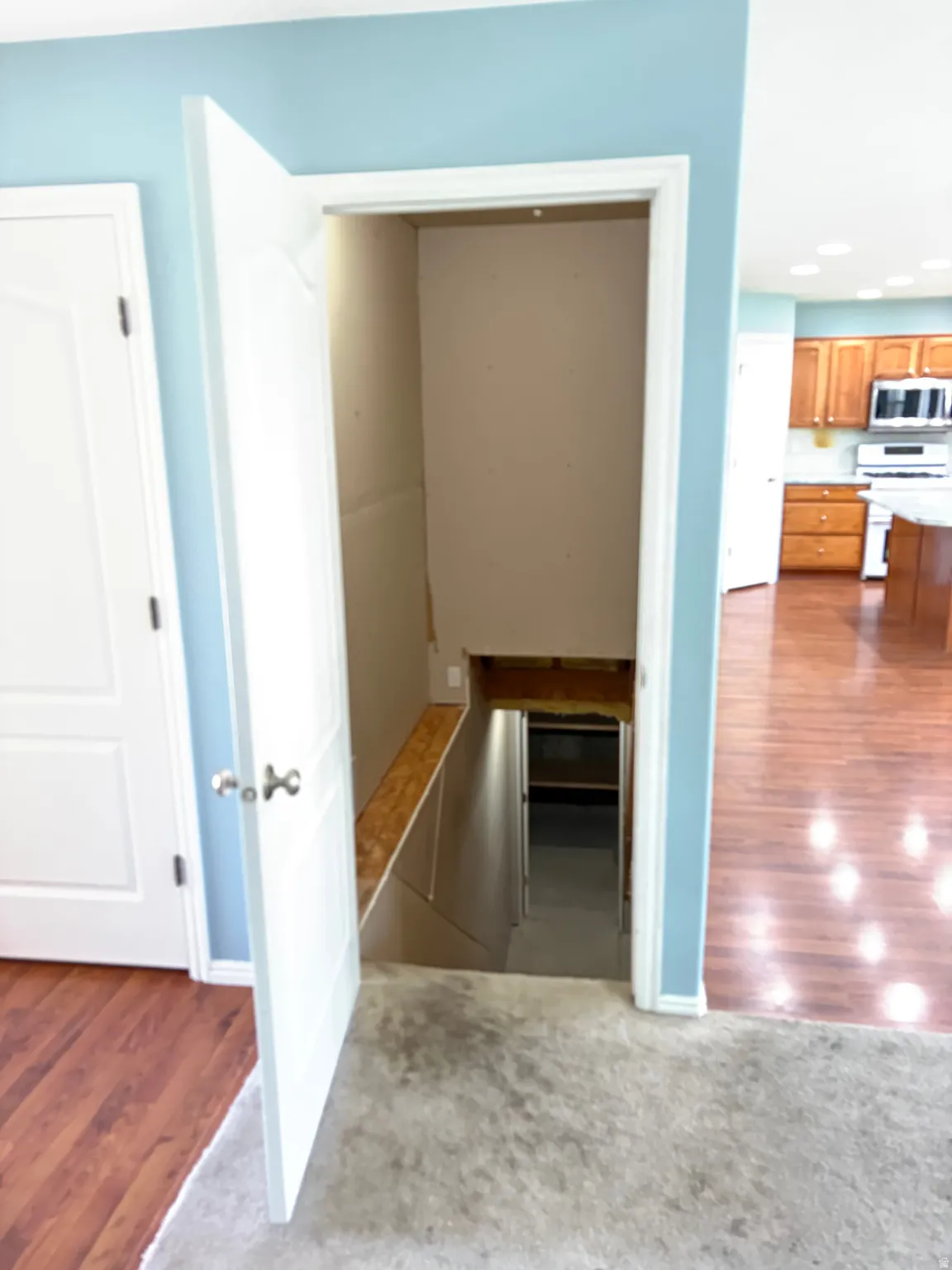 Open doorway revealing basement access