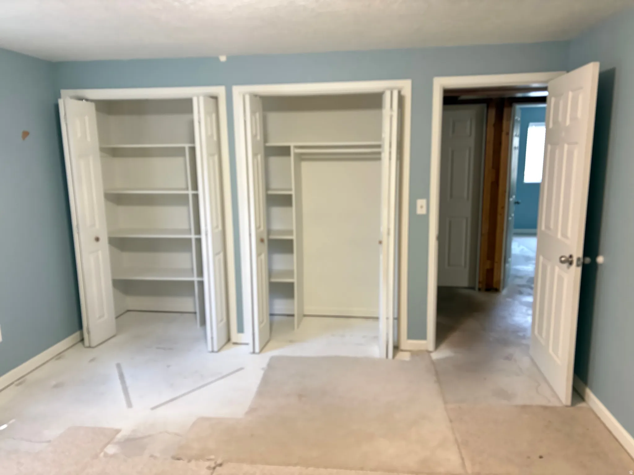Basement bedroom with two double closets.