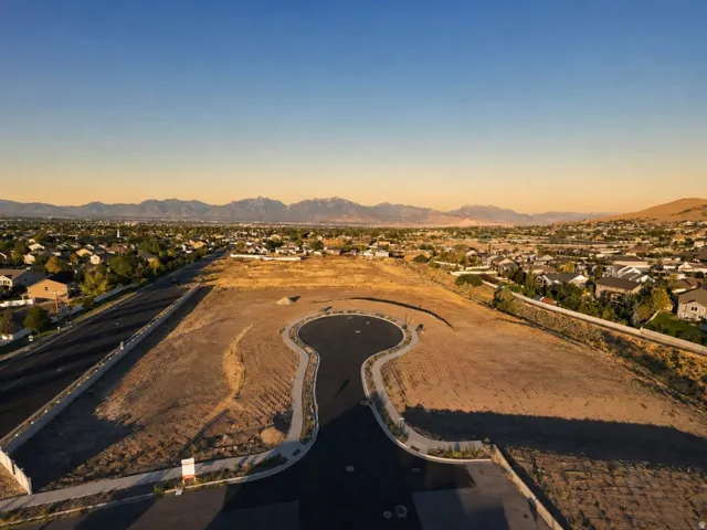 Graded lot featuring a cul-de-sac and mountain backdrop