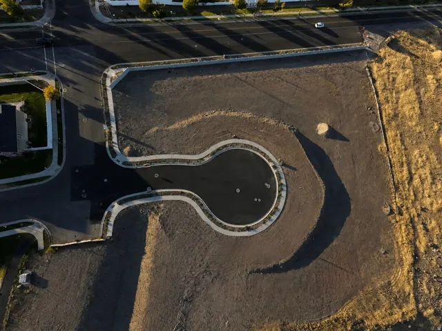 Developed residential land featuring paved streets and curbed sidewalks