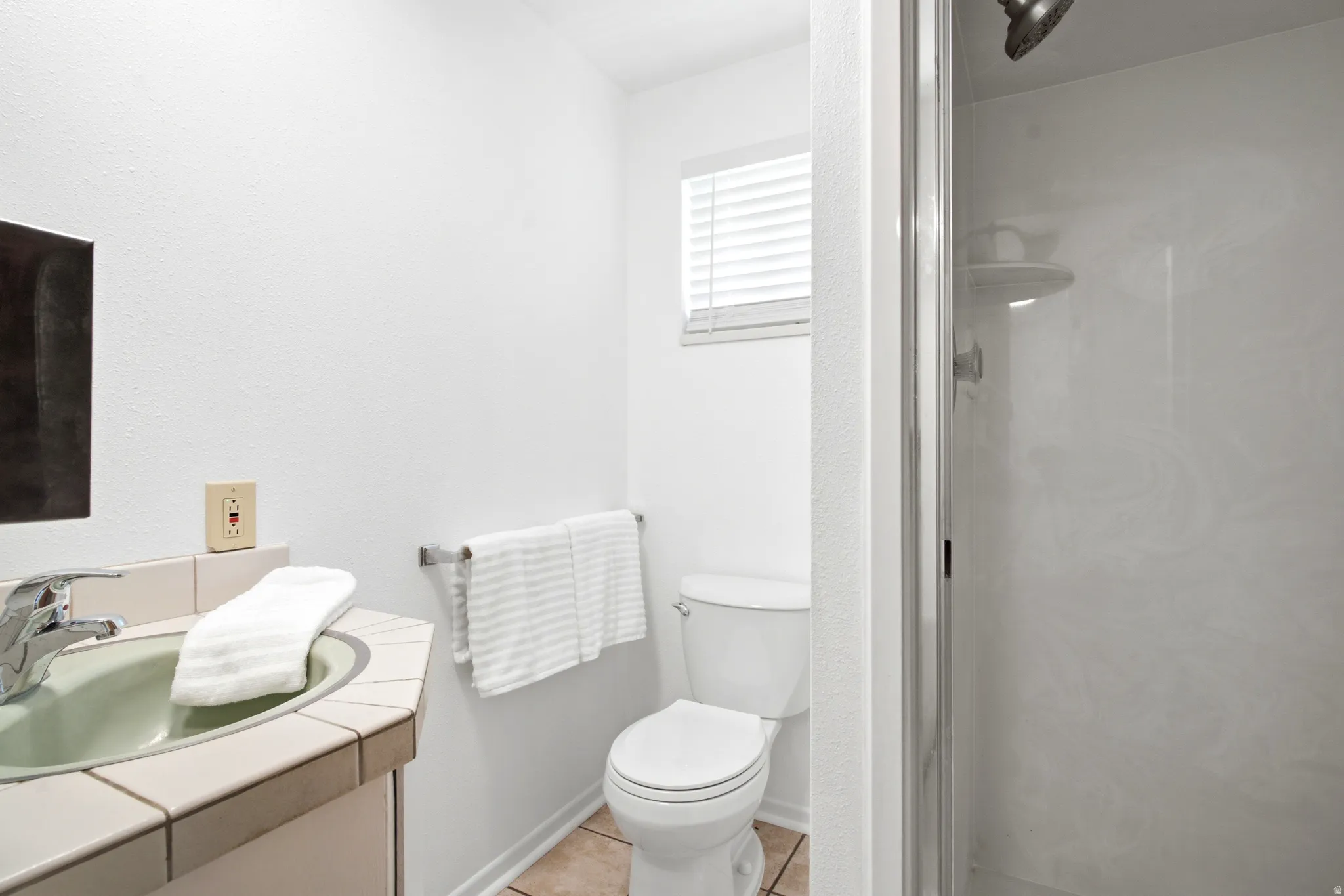 Primary bedroom with ensuite bathroom
