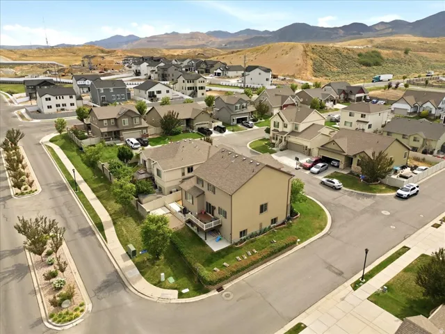 Residential neighborhood featuring single-family homes with paved streets and sidewalks