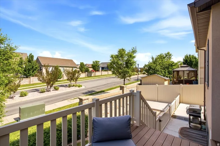 Composite decking balcony overlooking a residential street