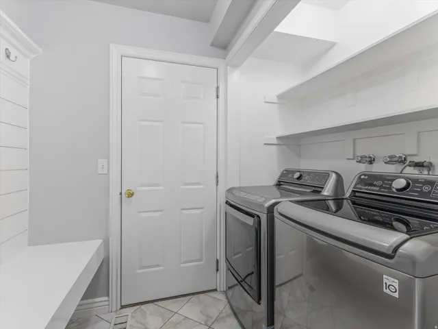 Laundry room/mud room with garage entrance