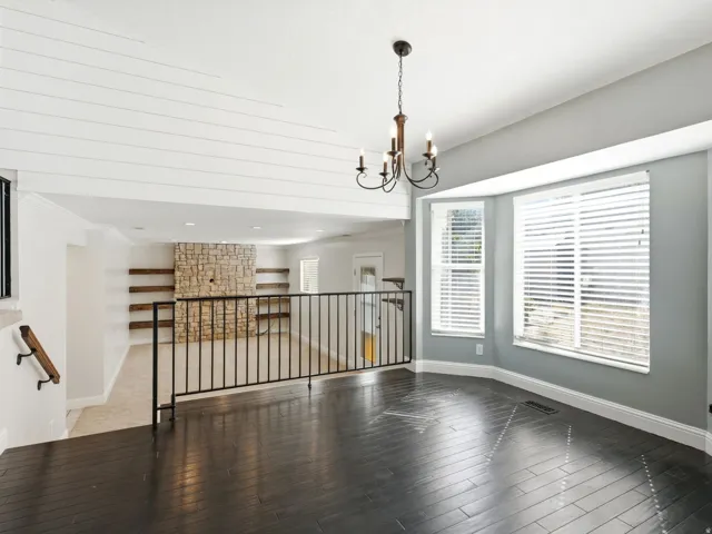 Spacious dining area with hardwood floors