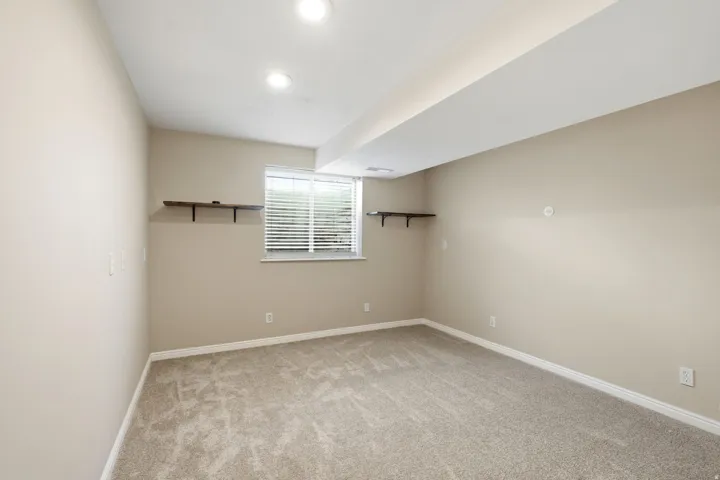 Lower level family room-also great space for home office-new carpet