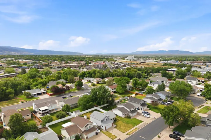 Expansive aerial perspective showcasing a residential area with varied housing styles