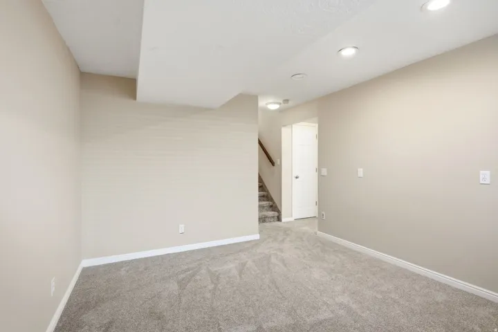Lower level family room-also great space for home office-new carpet