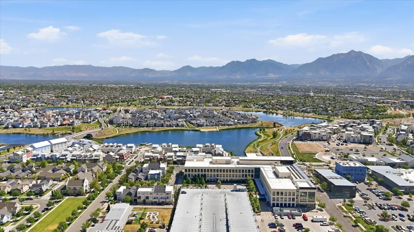 Expansive aerial perspective showcasing a master-planned community with extensive waterways
