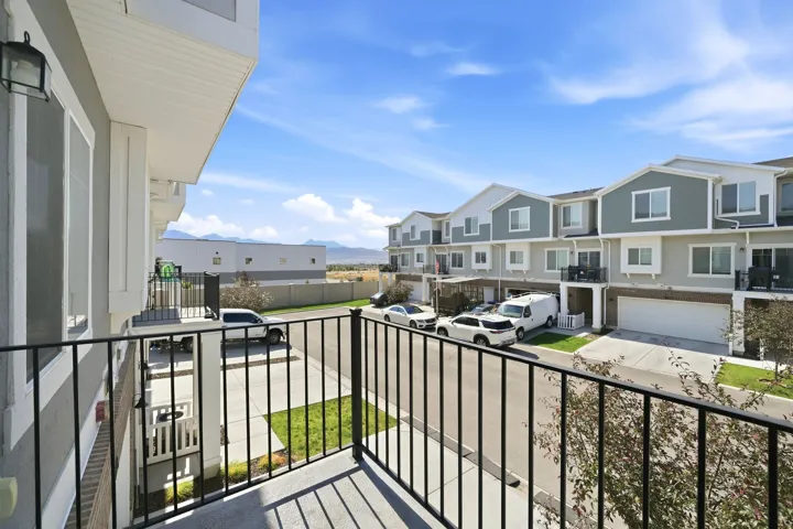 Private balcony with black metal railing