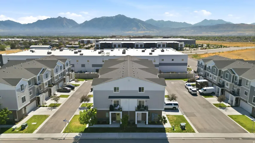 Townhome community featuring contemporary architecture with mountain scenery