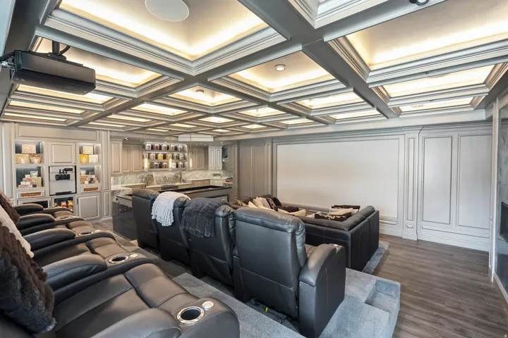 Coffered ceiling with recessed lighting and crown molding