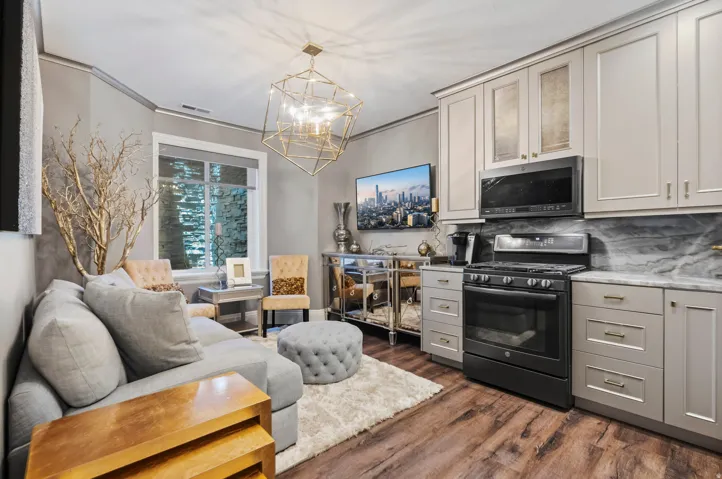 Compact living area featuring a modern kitchen and lounge space
