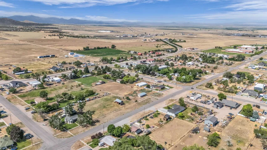 Aerial perspective showcasing a residential community with diverse property sizes and architectural styles