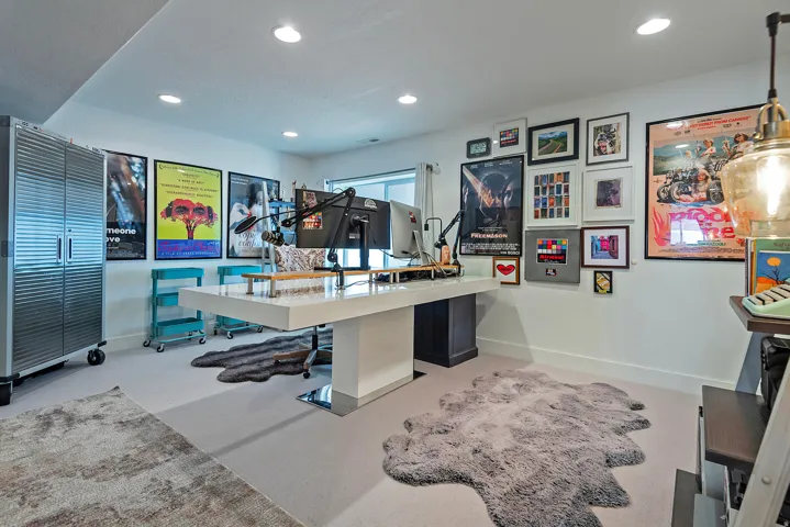 Expansive room featuring recessed lighting, light-toned carpeting, a large window, and massive closet