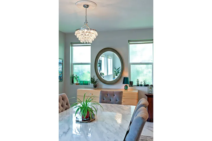 Elegant chandelier with a decorative ceiling medallion