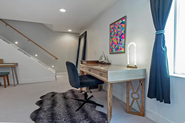 Neutral wall color with recessed lighting throughout