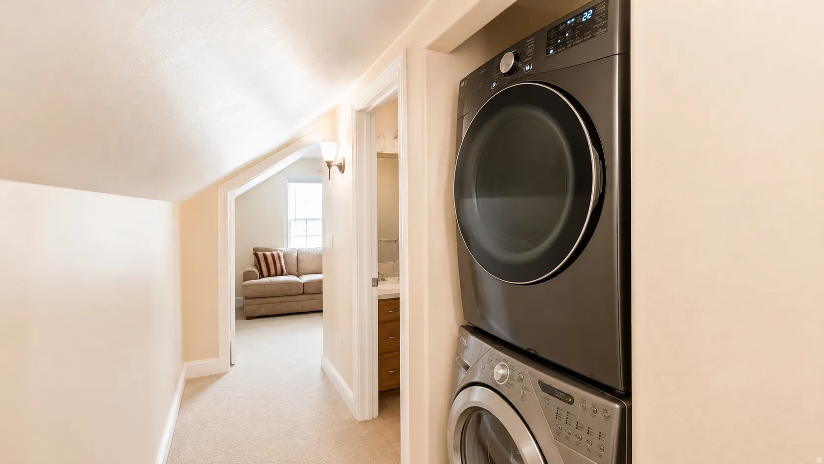 ADU #2 - Integrated laundry appliances featuring a stacked washer and dryer