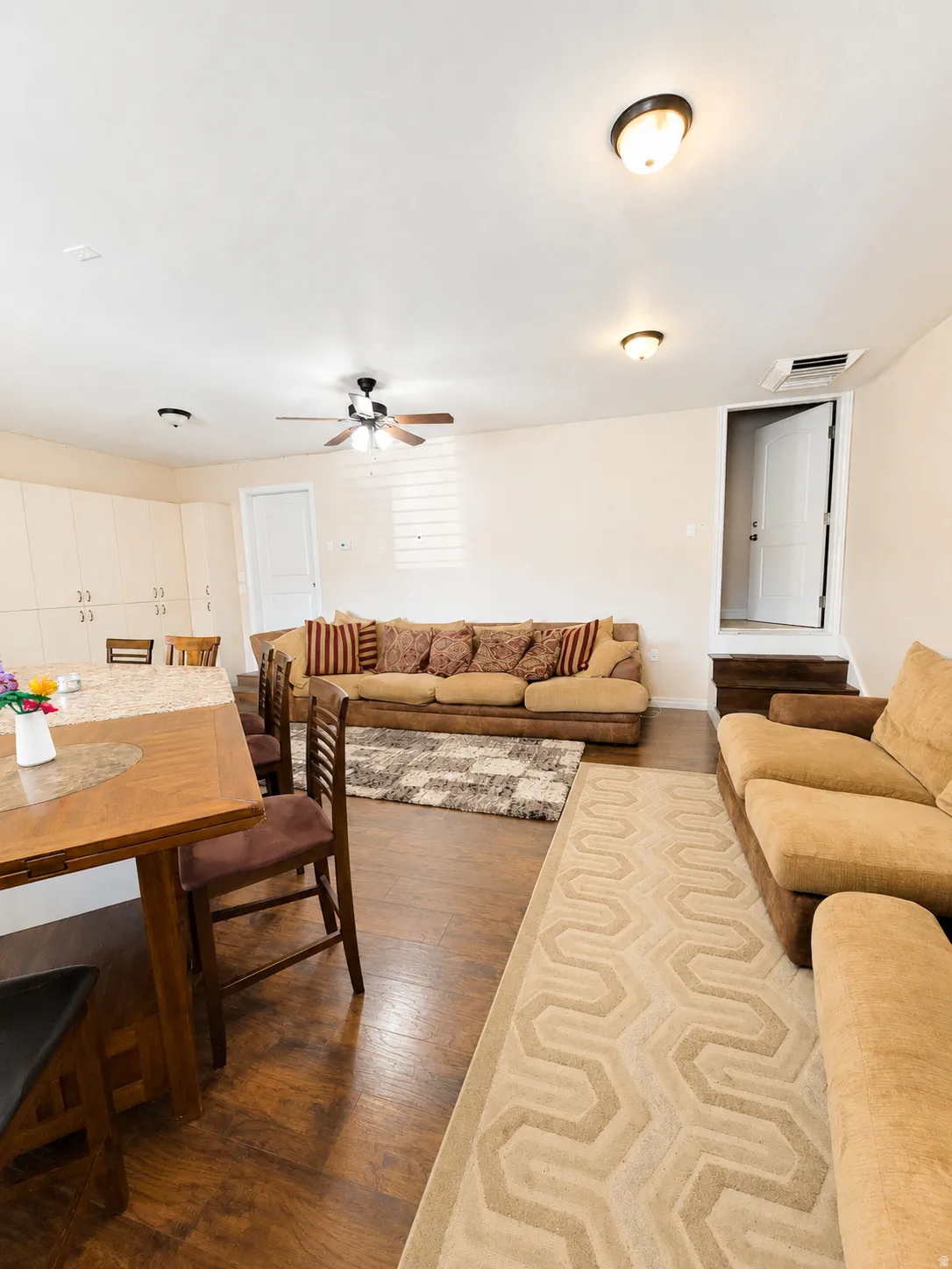 ADU #2 - Open-concept living area featuring wood-finish flooring