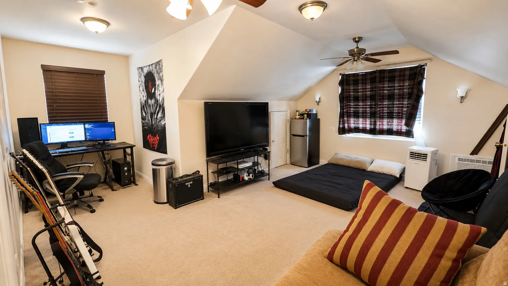 ADU #2 - Expansive room featuring sloped ceilings, recessed lighting, and neutral carpeting