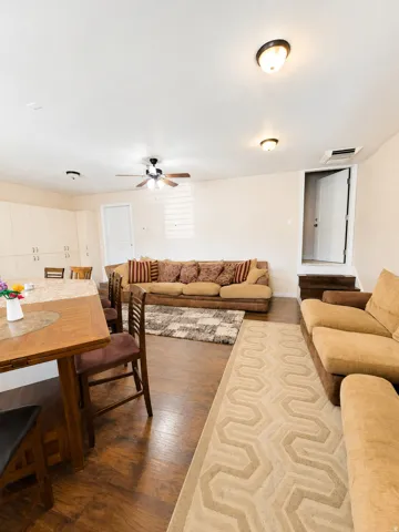 ADU #2 - Open-concept living area featuring wood-finish flooring