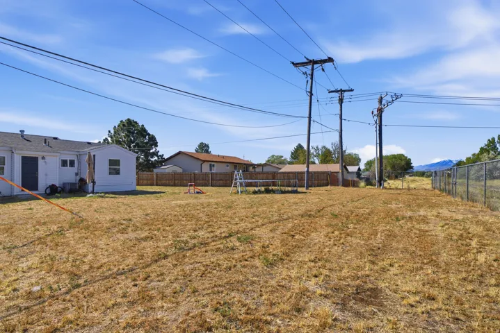 Expansive outdoor area featuring a wide, open lot