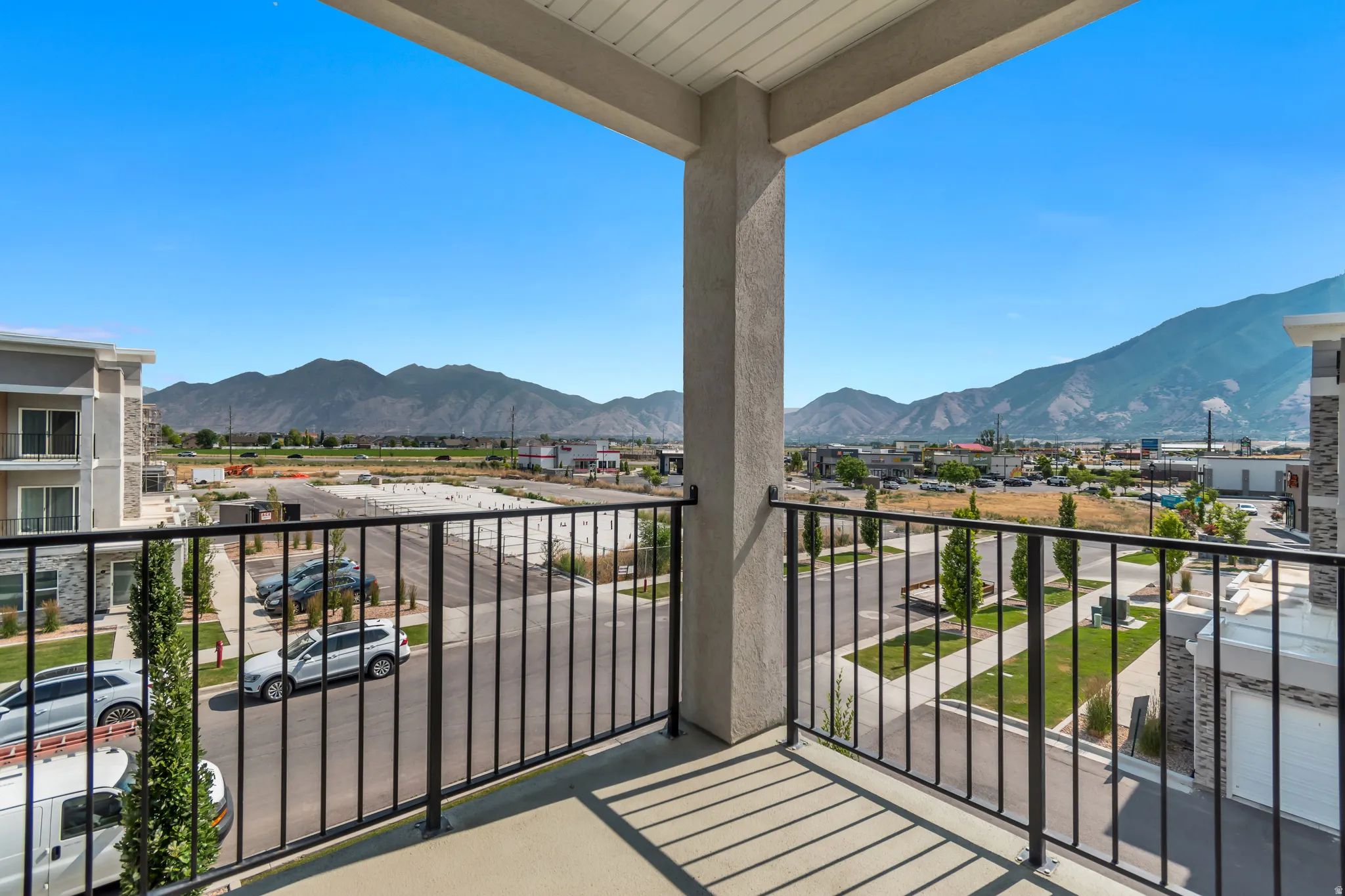 Balcony with black metal railings and spectacular view