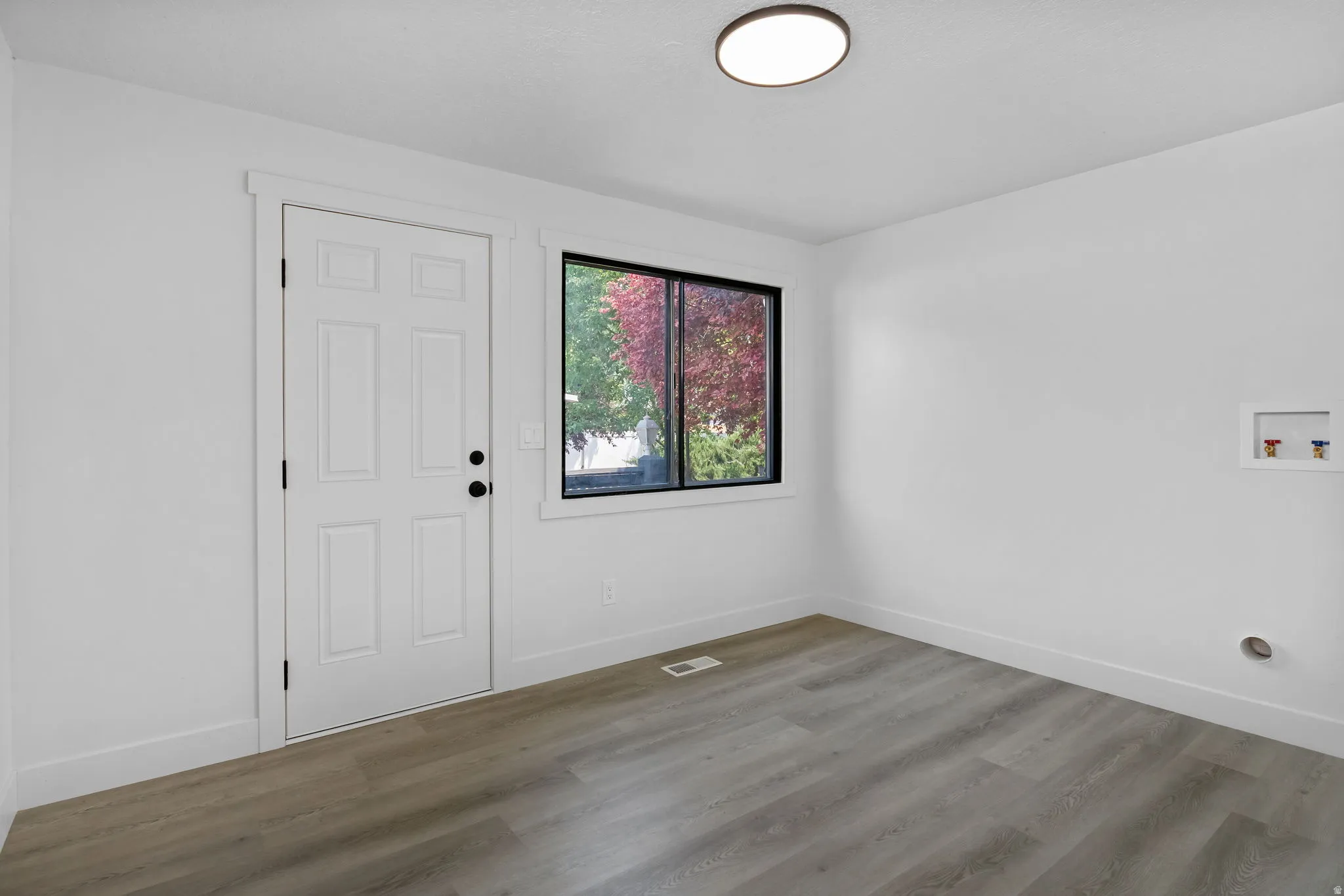 Rear Entrance to Mudroom / Laundry