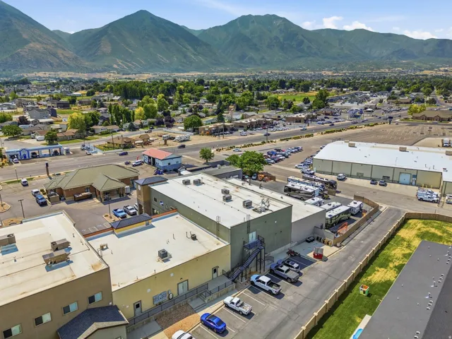Commercial properties featuring multiple buildings and parking areas