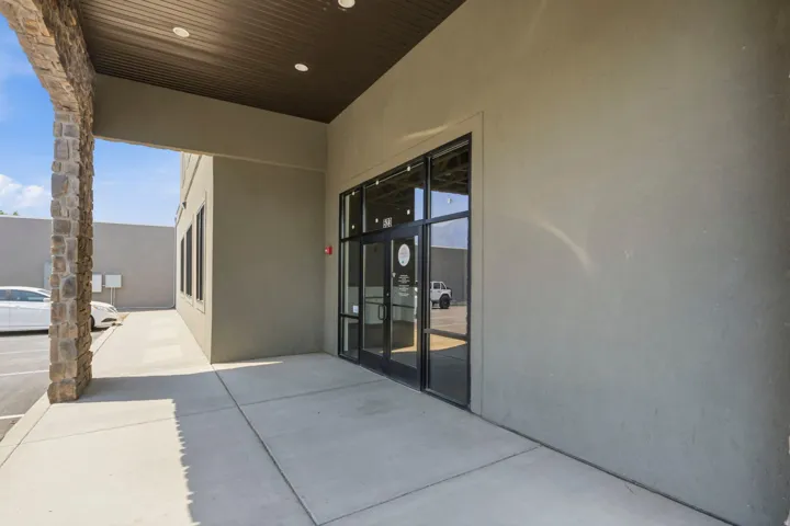 Stucco exterior with stone veneer column detailing