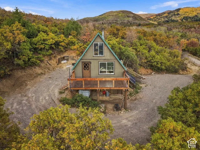 A-frame structure with a pitched metal roof