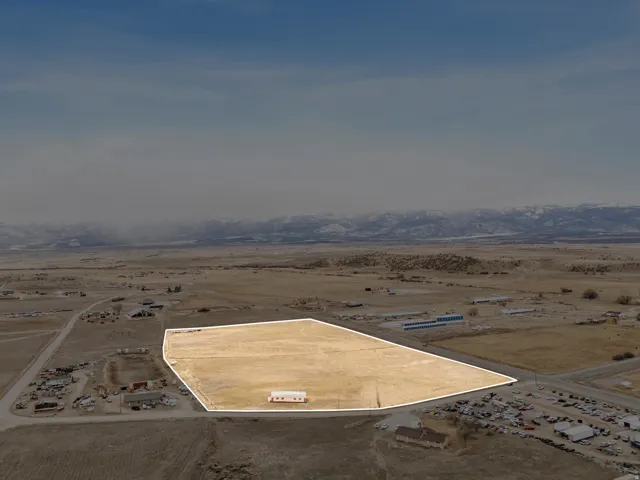 Expansive undeveloped land parcel featuring a large open field